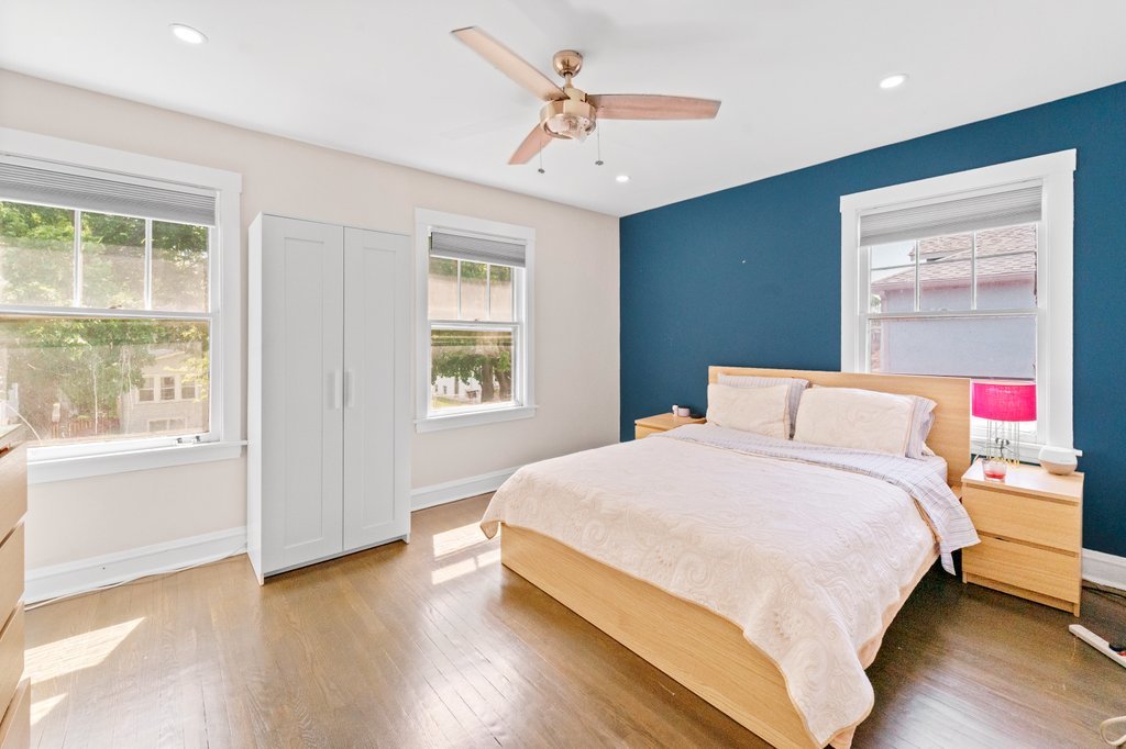 1224 Grove Avenue Berwyn, IL 60402 - Photo 13 of 23 a bedroom with a bed and a window