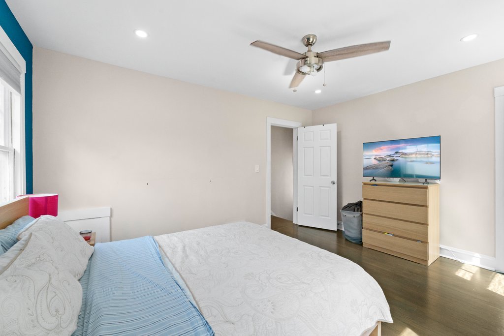 1224 Grove Avenue Berwyn, IL 60402 - Photo 14 of 23 a bedroom with a bed and a dresser