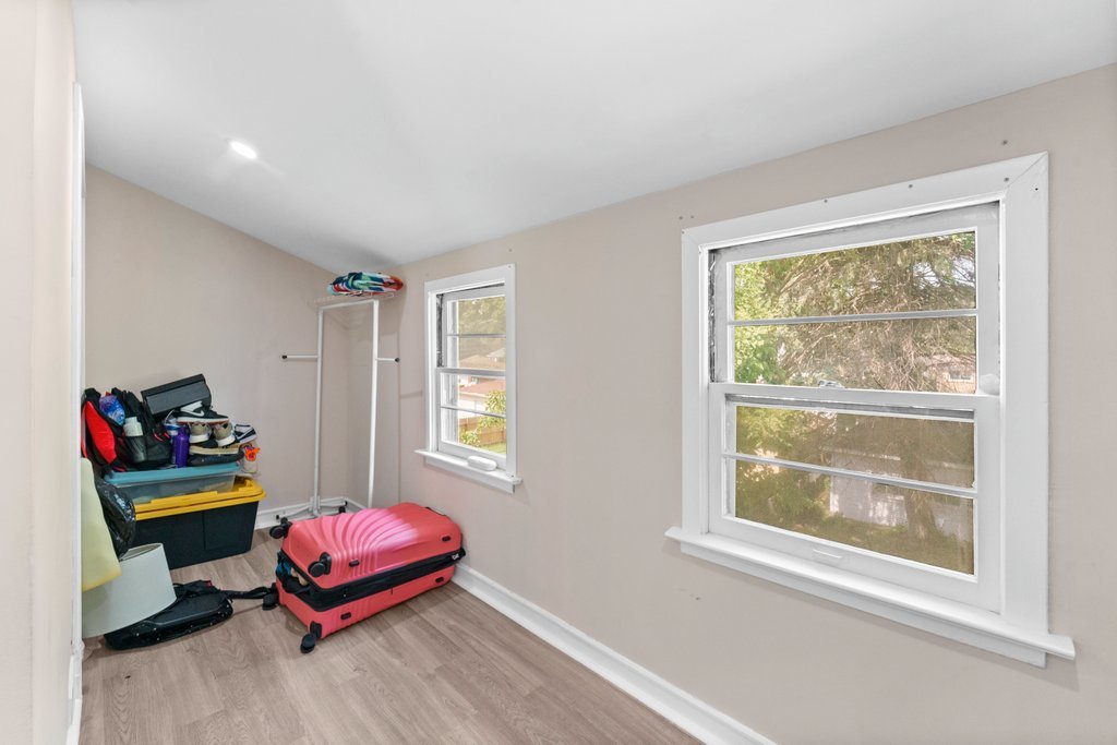 1224 Grove Avenue Berwyn, IL 60402 - Photo 16 of 23 a living room with furniture and a window
