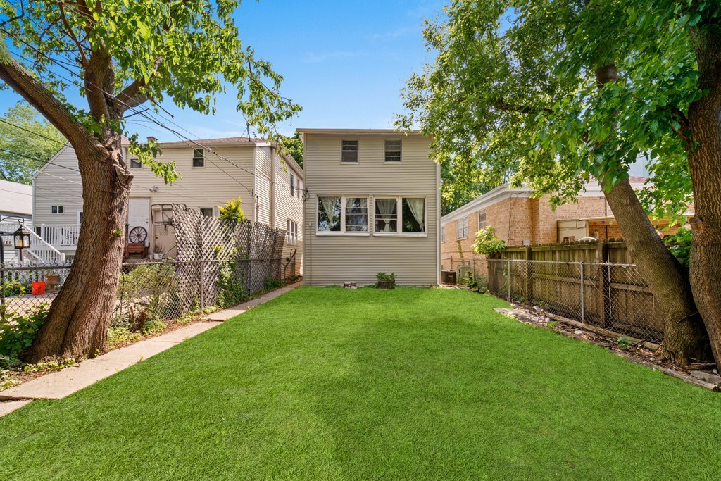 1224 Grove Avenue Berwyn, IL 60402 - Photo 3 of 23 an outdoor view of house and backyard with green space