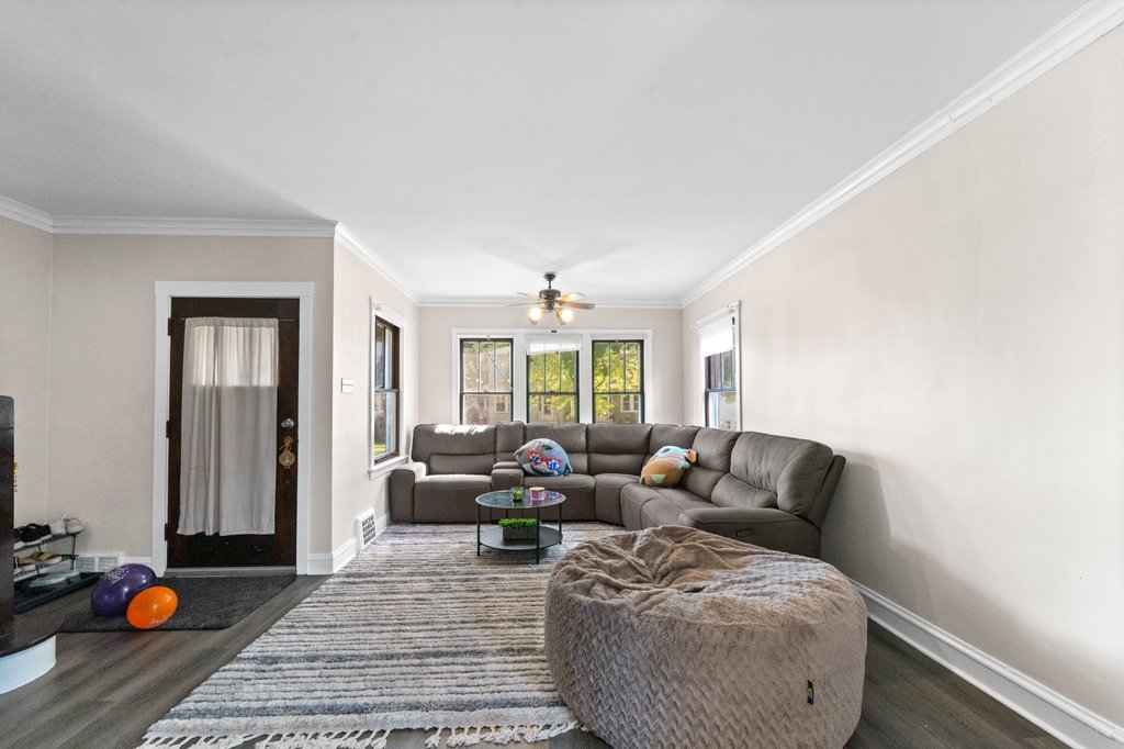 1224 Grove Avenue Berwyn, IL 60402 - Photo 5 of 23 a living room with furniture chess board and a window