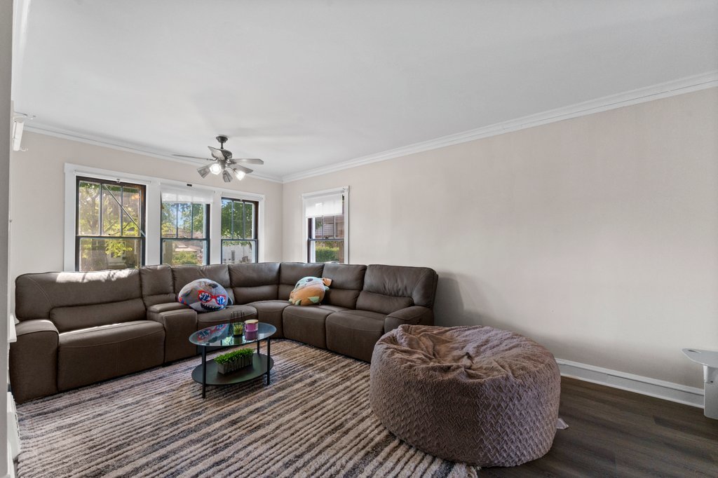 1224 Grove Avenue Berwyn, IL 60402 - Photo 6 of 23 a living room with furniture and a wooden floor