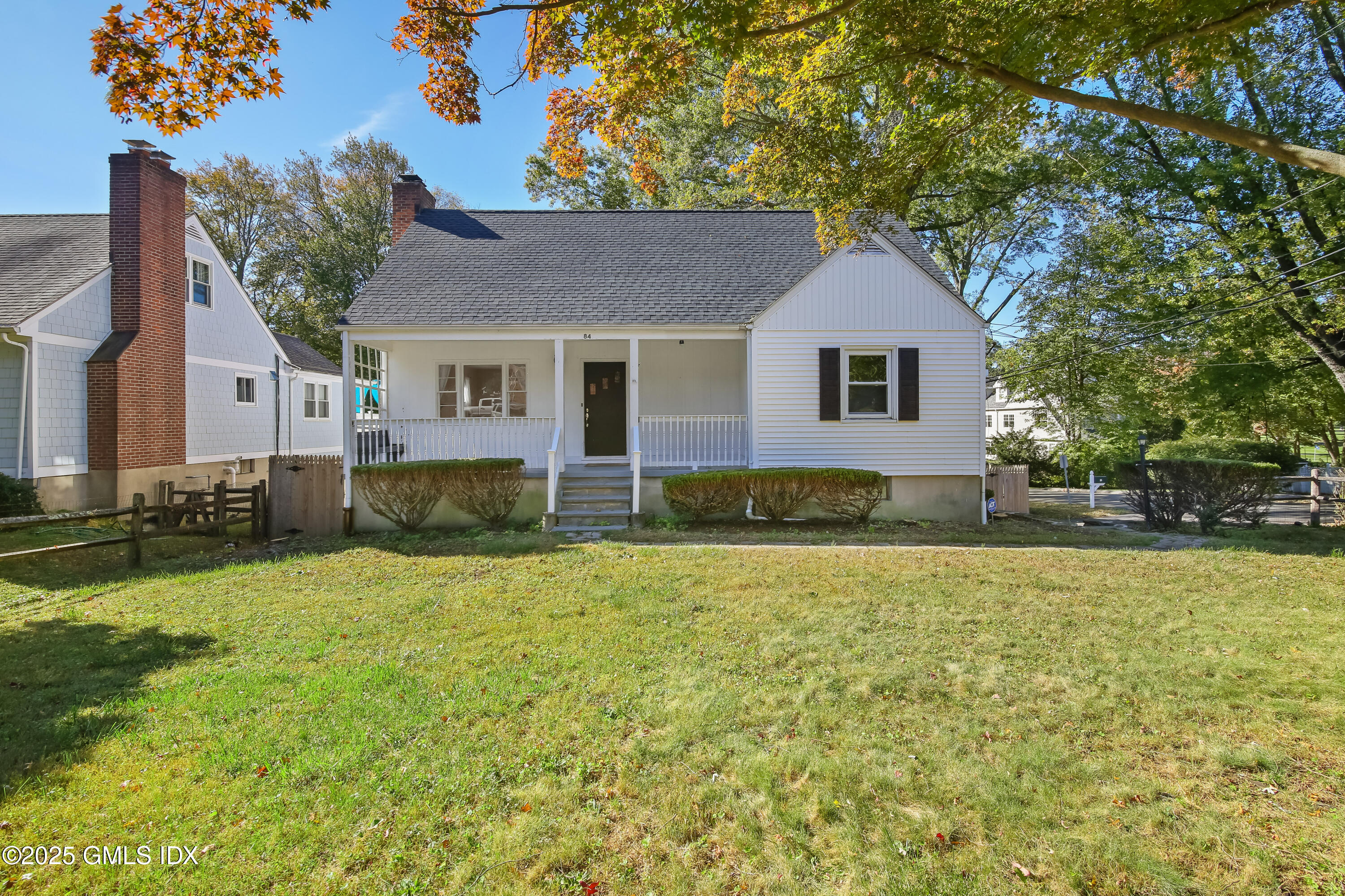 84 Indian Field Road Greenwich, CT 06830 - Photo 2 of 40 a house view with a garden space