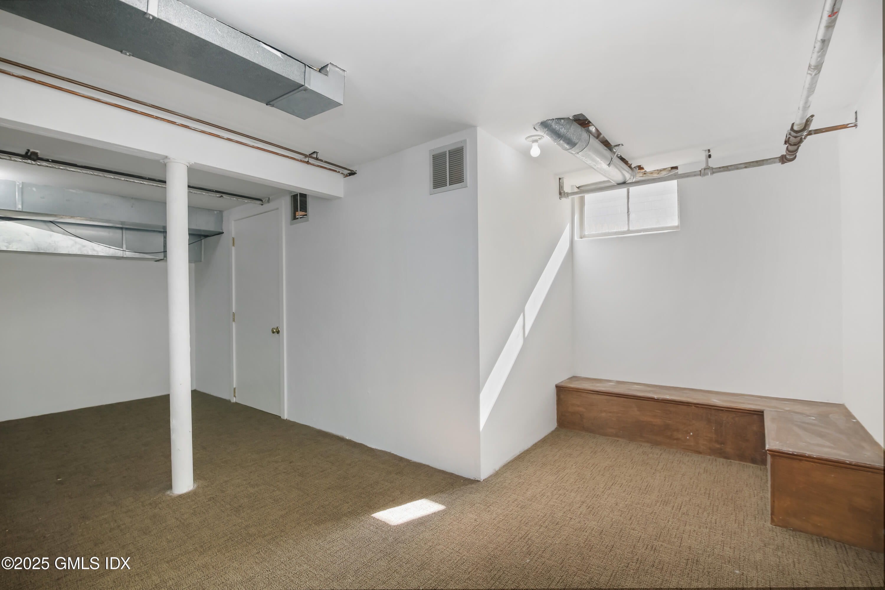 84 Indian Field Road Greenwich, CT 06830 - Photo 30 of 40 a view of an empty room