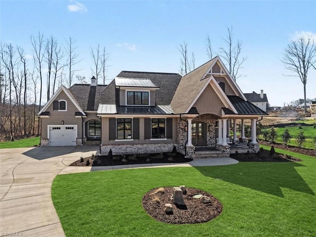 8799 Knoll Creek Oak Ridge, NC 27310 - Photo 2 of 37 Digitally enhanced photo adding grass
