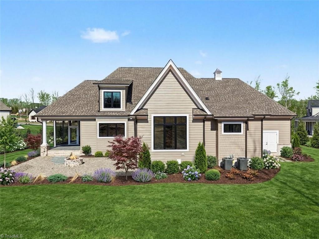 8799 Knoll Creek Oak Ridge, NC 27310 - Photo 34 of 37 Digitally enhanced photo adding grass and landscaping