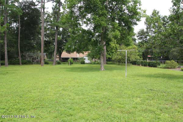8948 San Rae Road Jacksonville, FL 32257 - Photo 15 of 15 a view of a park with large trees