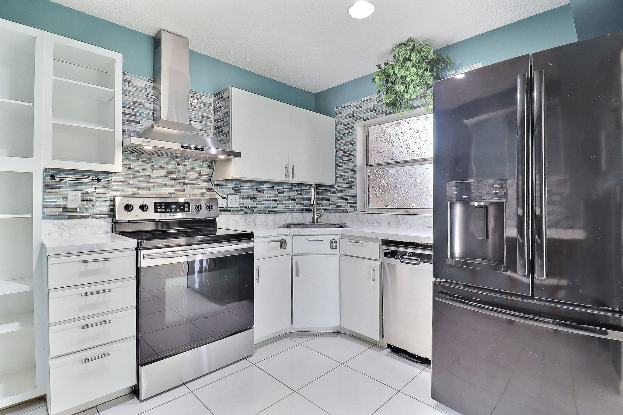 8577 Boca Glades Boulevard West, Unit D Boca Raton, FL 33434 - Photo 11 of 45 Kitchen