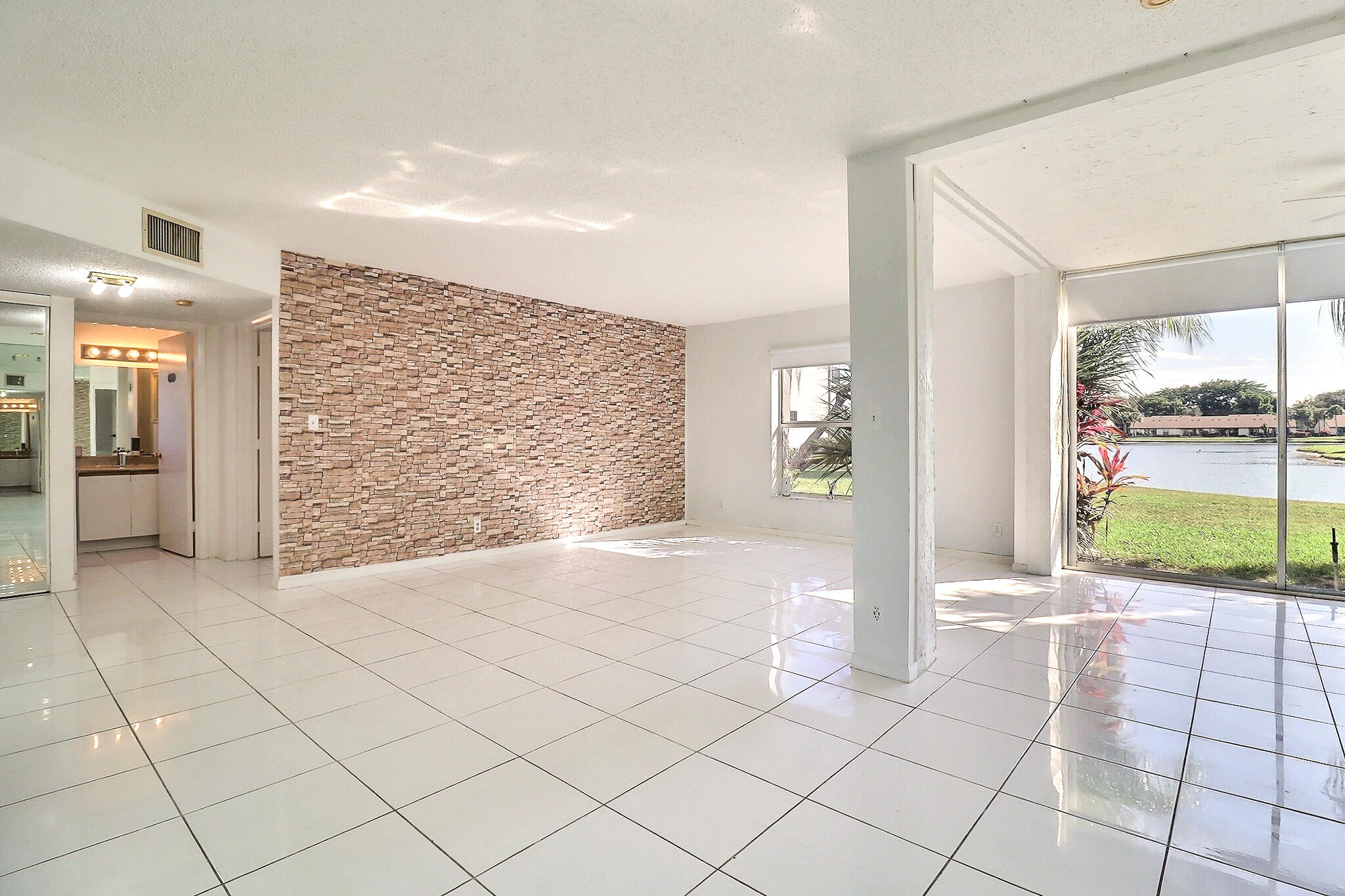 8577 Boca Glades Boulevard West, Unit D Boca Raton, FL 33434 - Photo 38 of 45 Living Room
