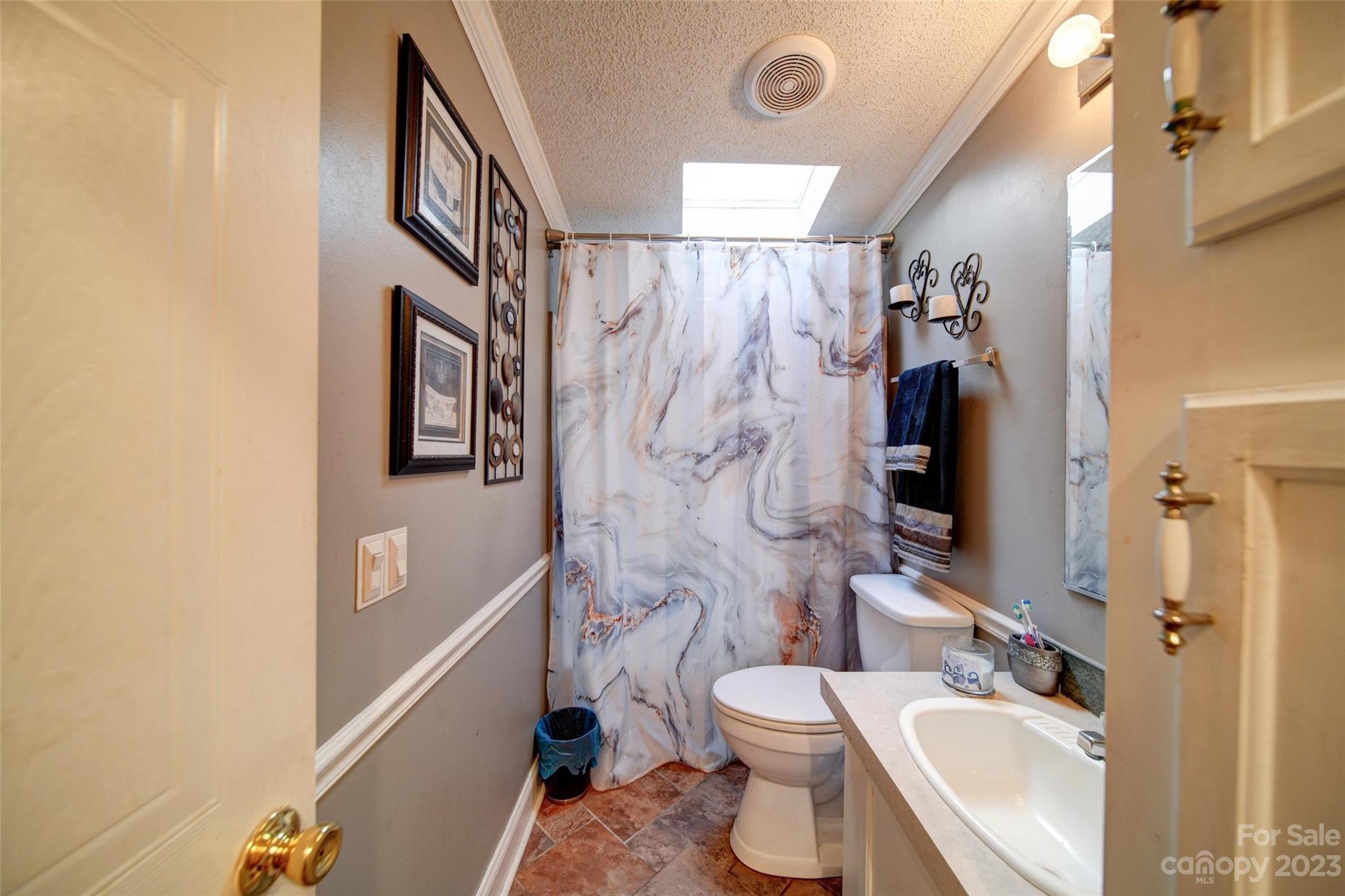 86 Edwards Store Road Peachland, NC 28133 - Photo 17 of 20 a bathroom with a sink toilet and shower