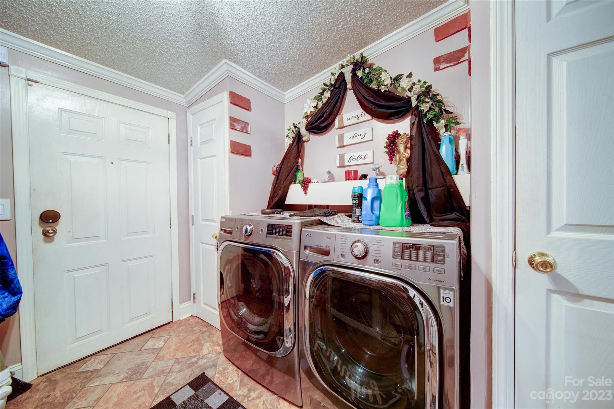 86 Edwards Store Road Peachland, NC 28133 - Photo 18 of 20 a view of small space dryer and washer