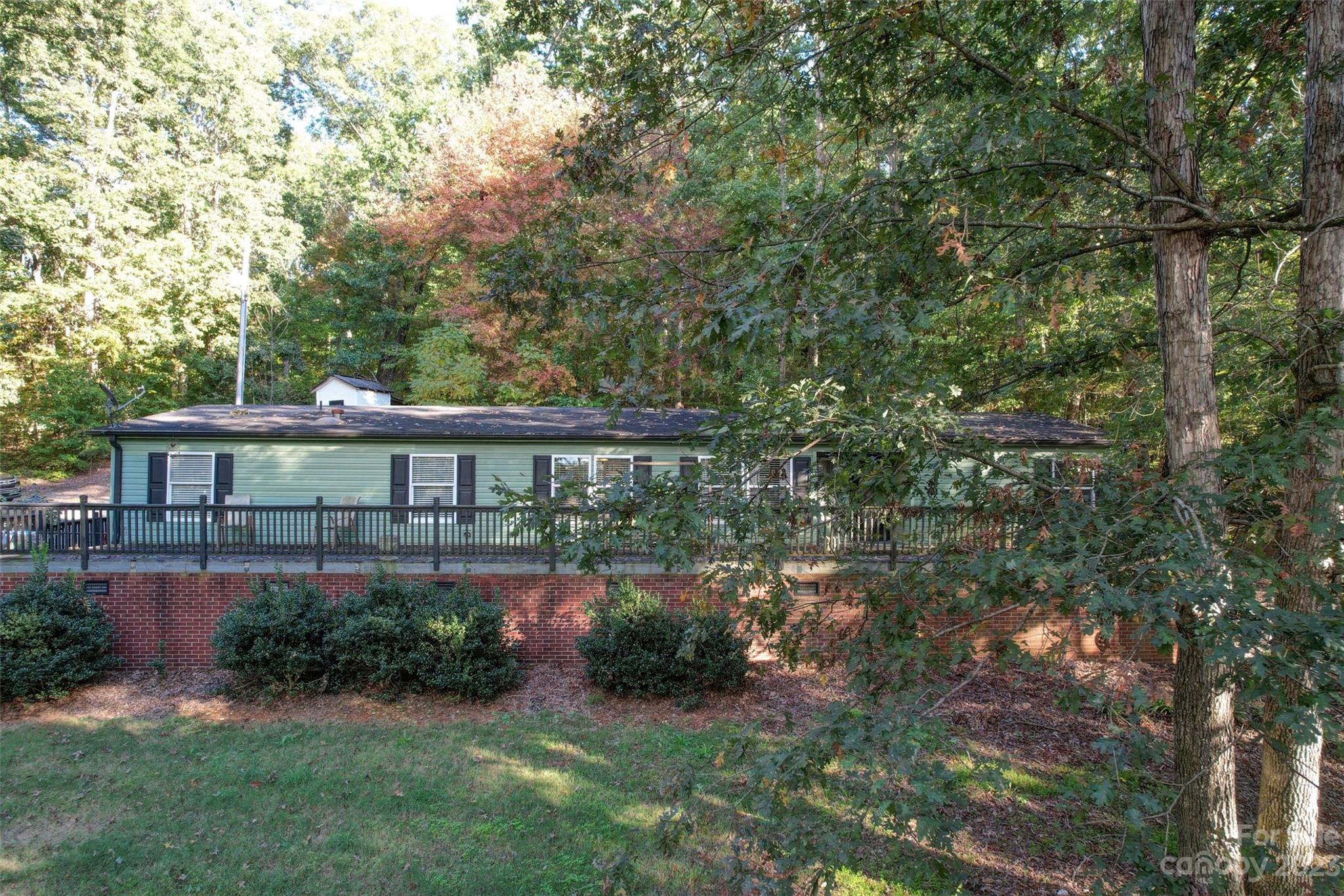 86 Edwards Store Road Peachland, NC 28133 - Photo 2 of 20 a front view of a house with garden