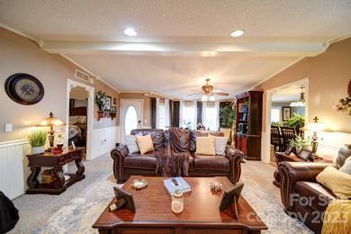86 Edwards Store Road Peachland, NC 28133 - Photo 7 of 20 a living room with furniture and a large window