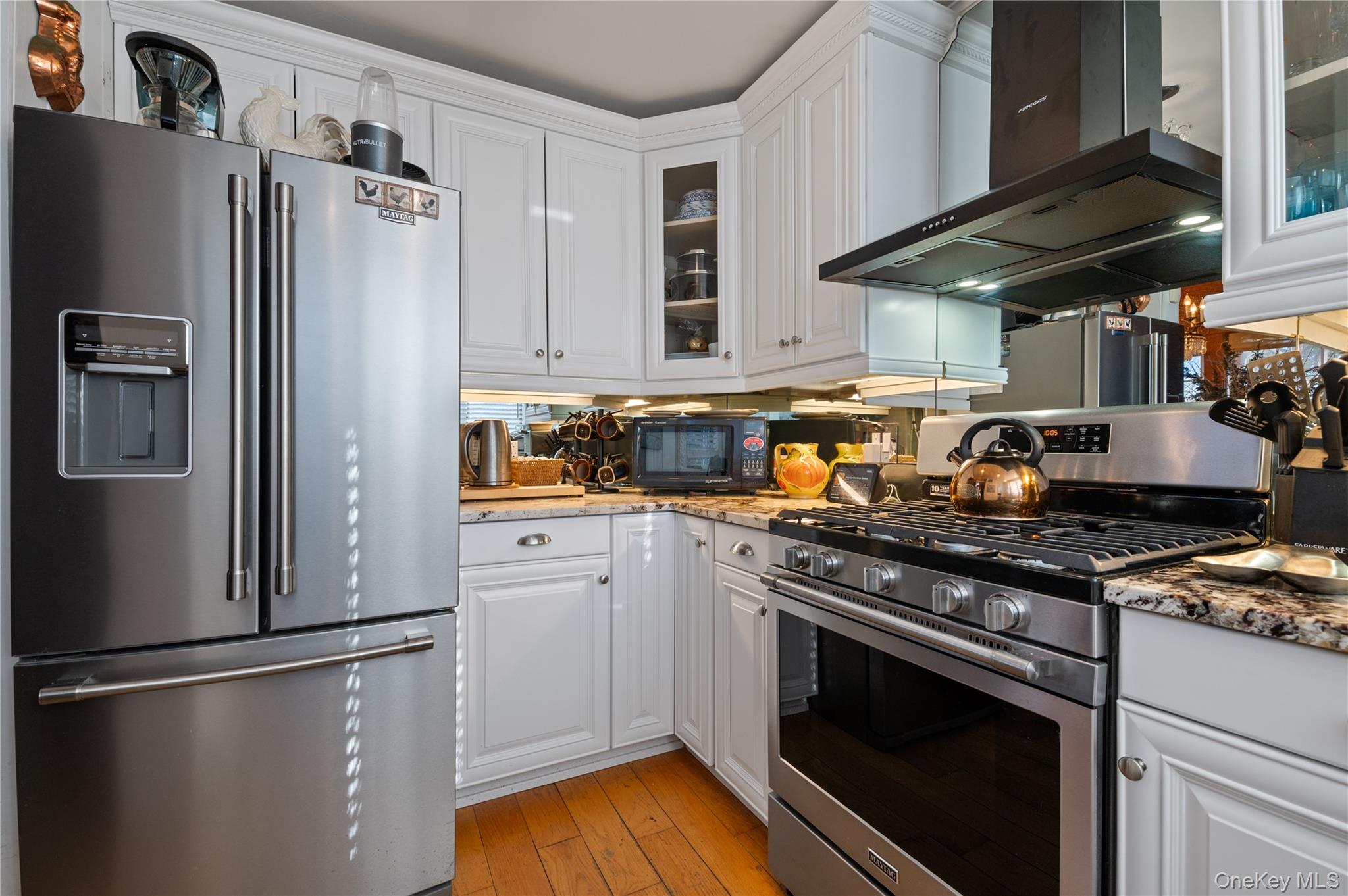 136 Beach Road Wading River, NY 11792 - Photo 25 of 45 Two years young, granite, stainless steel and mirror backsplash