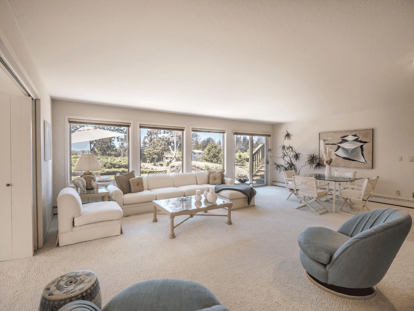 210 Greenbrier Drive Aptos, CA 95003 - Photo 11 of 63 a living room with furniture and a large window with balcony view