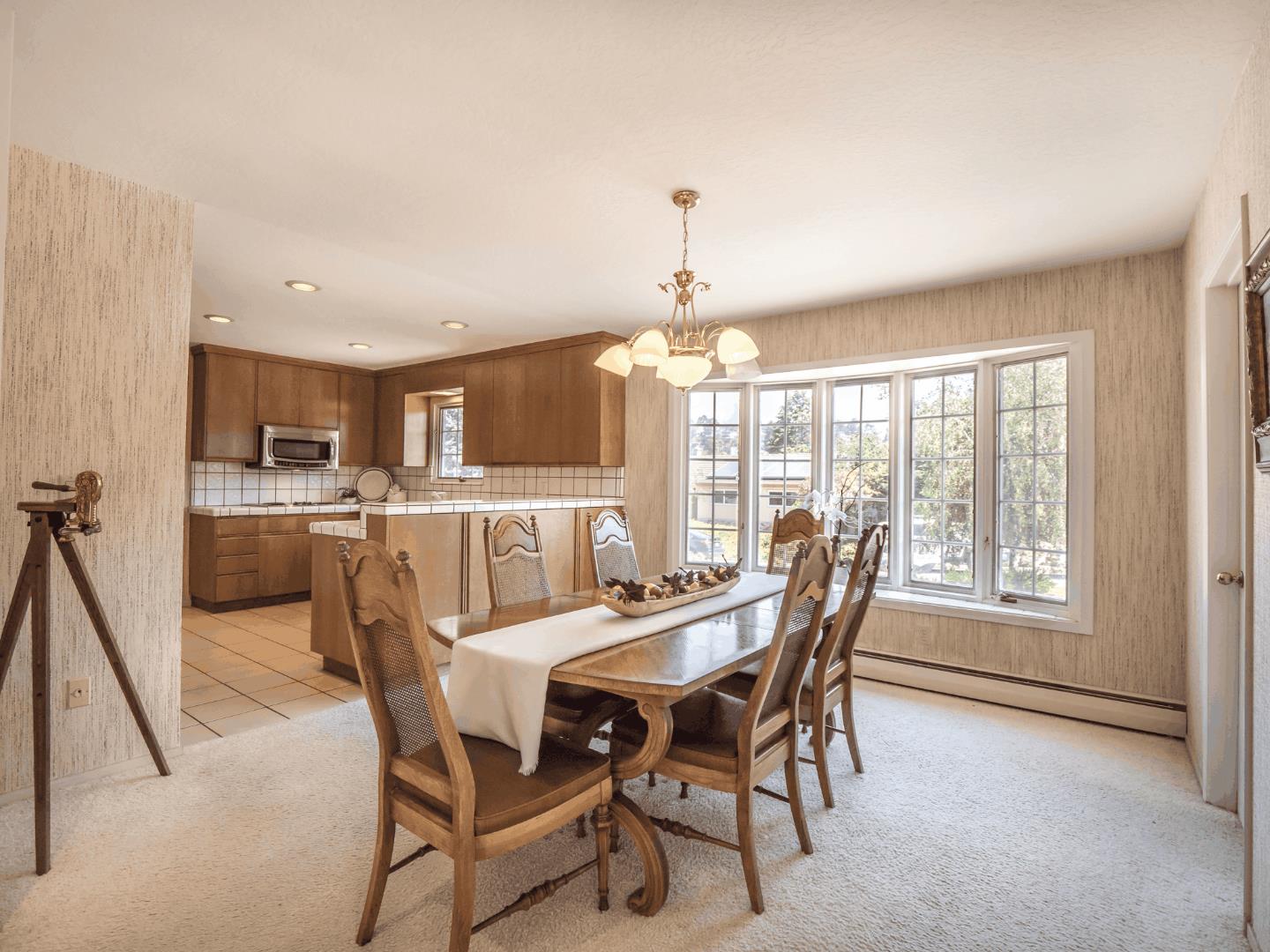 210 Greenbrier Drive Aptos, CA 95003 - Photo 15 of 63 a dining room with furniture and window