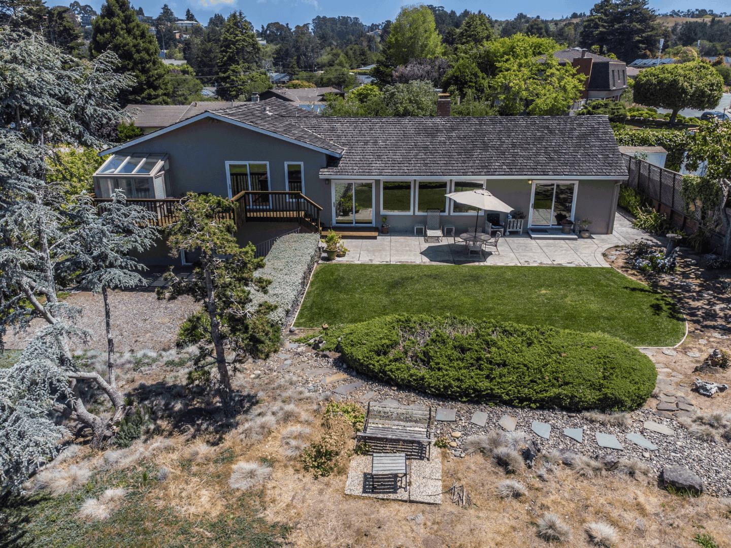 210 Greenbrier Drive Aptos, CA 95003 - Photo 26 of 63 a front view of a house with a garden