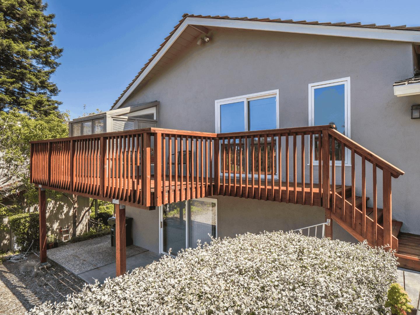 210 Greenbrier Drive Aptos, CA 95003 - Photo 34 of 63 a view of a wooden balcony with a bench