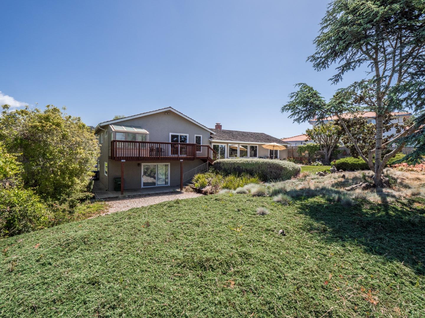 210 Greenbrier Drive Aptos, CA 95003 - Photo 55 of 63 a view of a house with a big yard and large trees