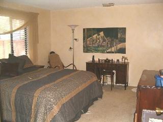80 El Pavo Real Circle San Rafael, CA 94903 - Photo 7 of 11 a bedroom with a bed and window