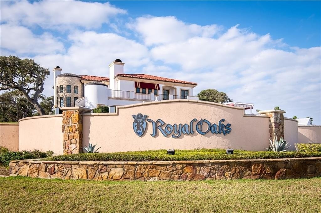 1035 North Fulton Beach Road Fulton, TX 78382 - Photo 2 of 25 a street sign on the side of building