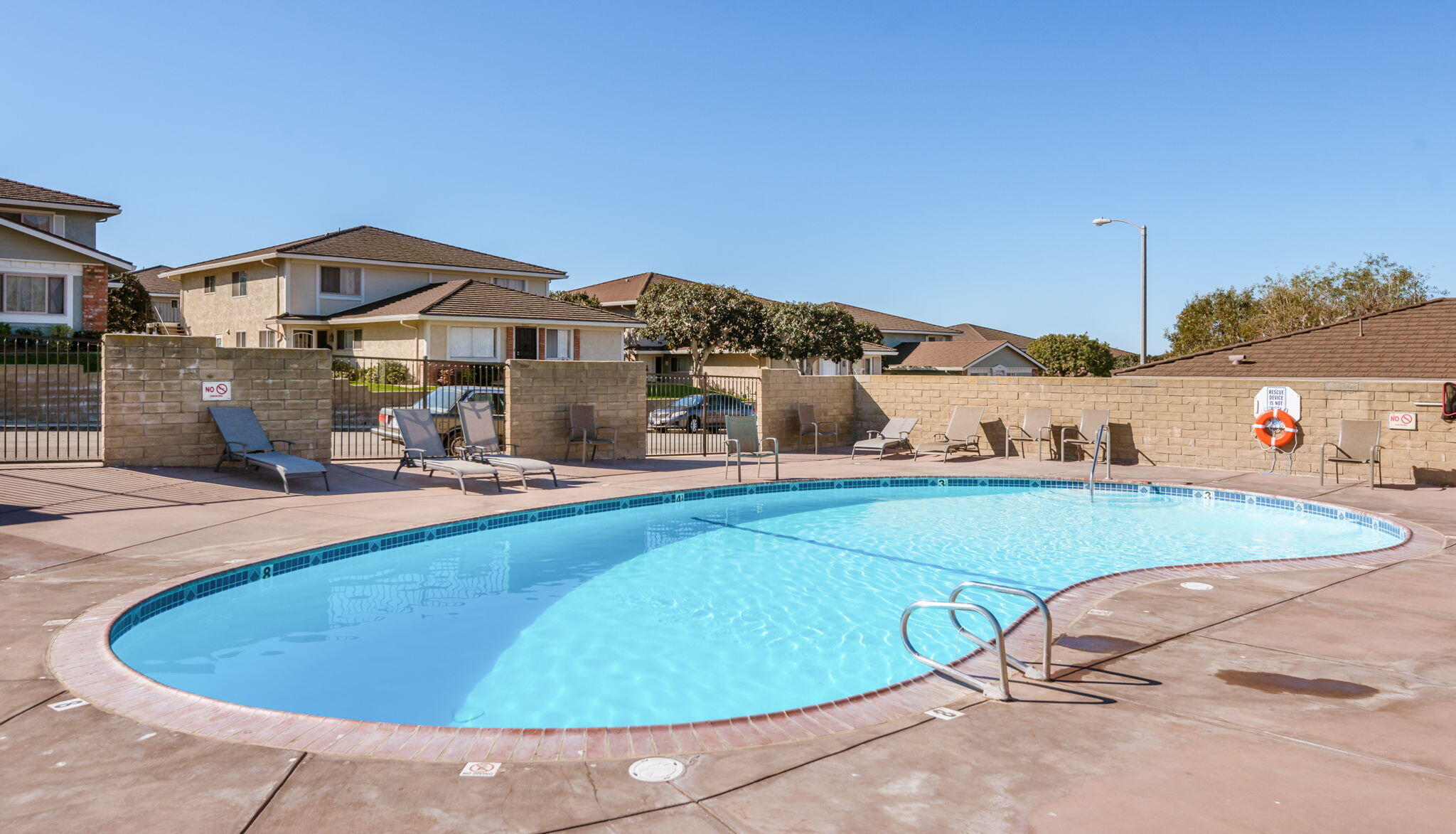 5930 Via Real, Unit 3 Carpinteria, CA 93013 - Photo 5 of 25 a view of a swimming pool with a yard