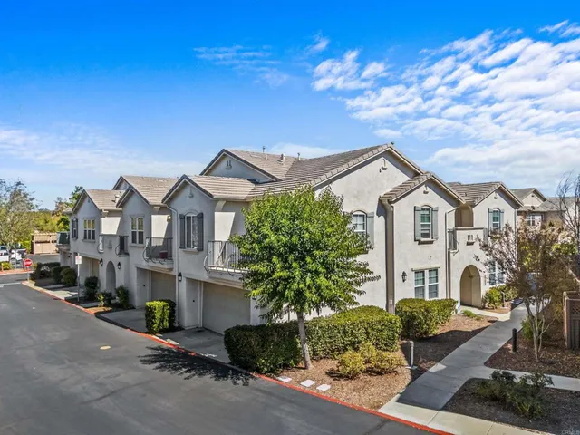 a view of a street in front of a building