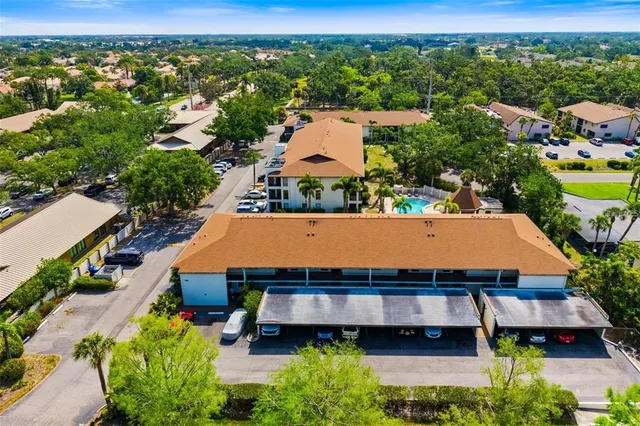 an aerial view of a house with a garden