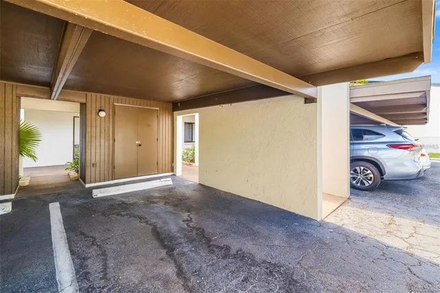 a view of a elevator with wooden door
