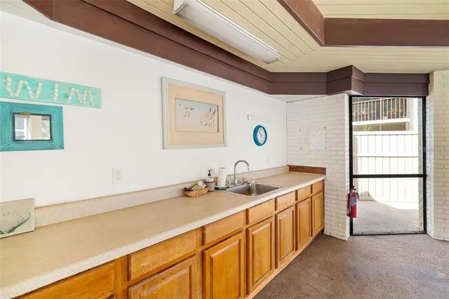 an aerial view of residential houses and outdoor space