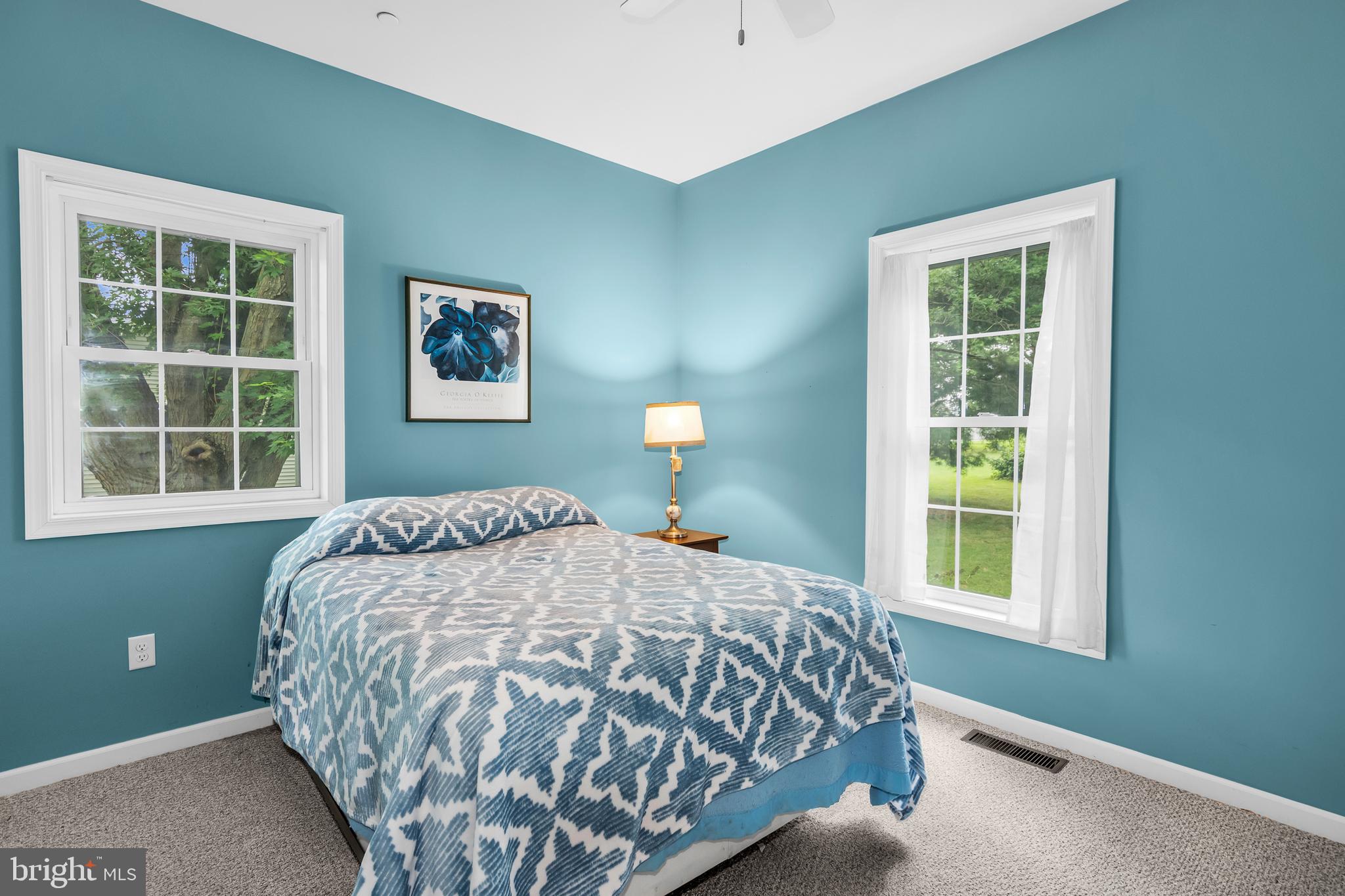 5440 Anchor Road Tilghman, MD 21671 - Photo 21 of 32 a bedroom with a bed and a window
