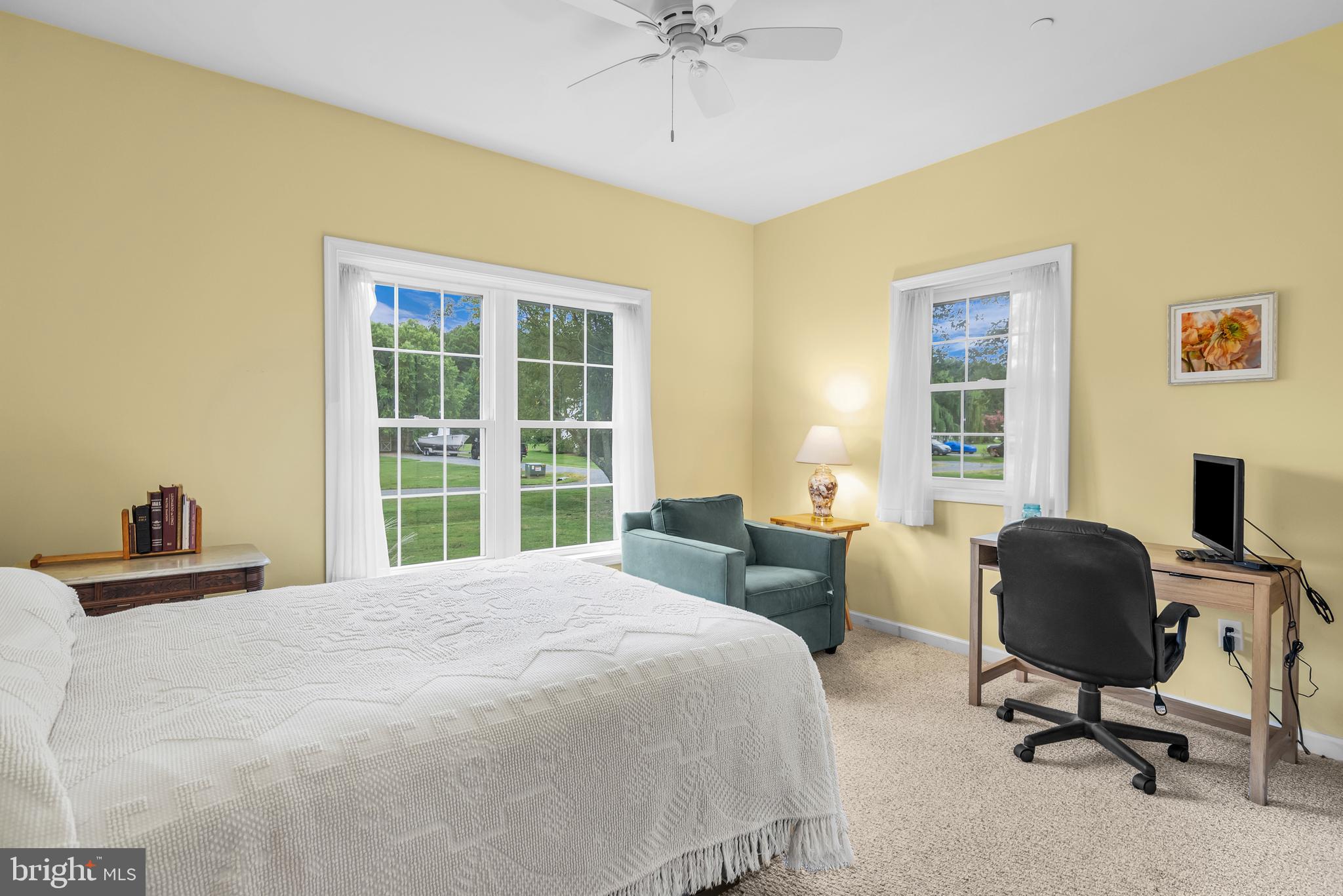 5440 Anchor Road Tilghman, MD 21671 - Photo 22 of 32 a bedroom with a bed chair and a window