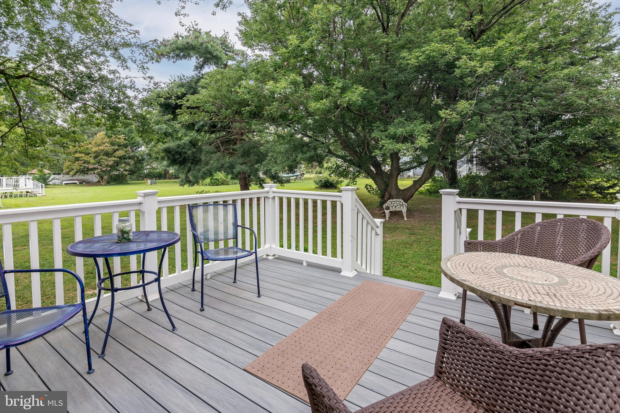 5440 Anchor Road Tilghman, MD 21671 - Photo 26 of 32 a view of a chairs and table on the wooden floor