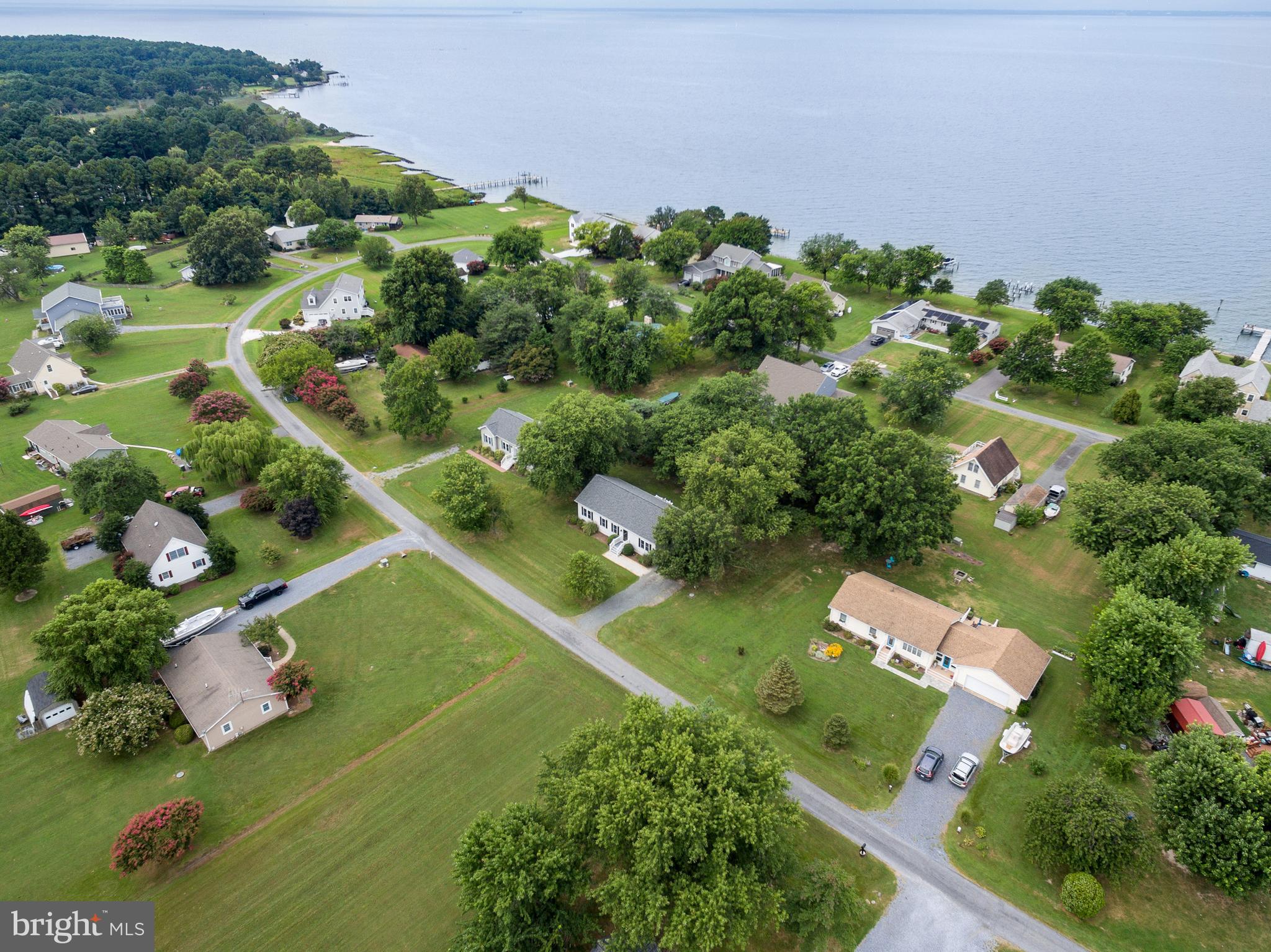 5440 Anchor Road Tilghman, MD 21671 - Photo 7 of 32 an aerial view of a house with a yard