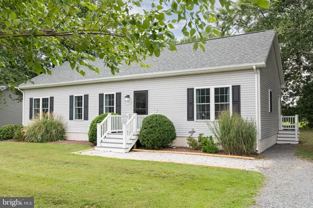 a house view with a garden space