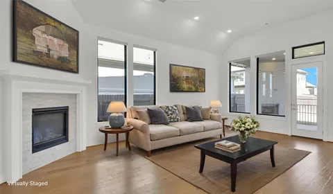 a large kitchen with stainless steel appliances granite countertop a large counter top a stove and a sink