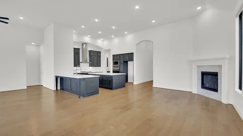 a room with furniture and a flat screen tv