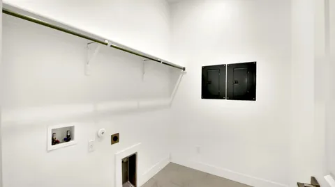 a bathroom with a double vanity sink and mirror