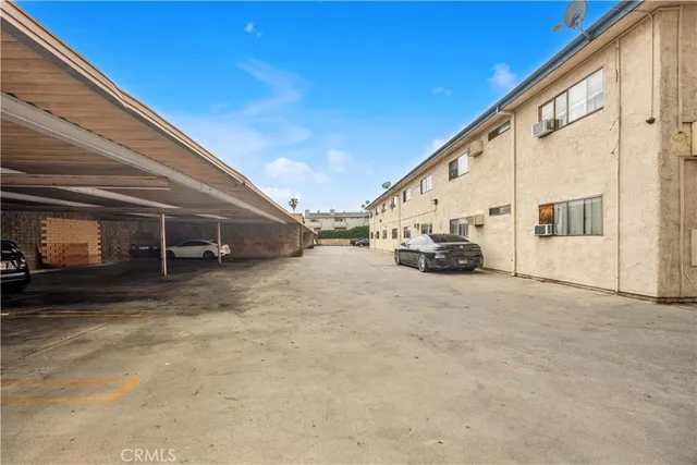 a view of car parked in front of house