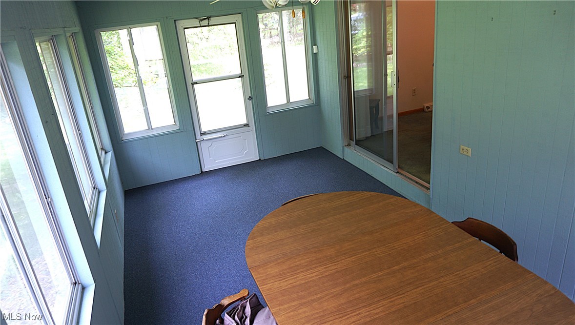 2100 West Pleasant Valley Road Cleveland, OH 44134 - Photo 24 of 30 Unfurnished sunroom with a chandelier