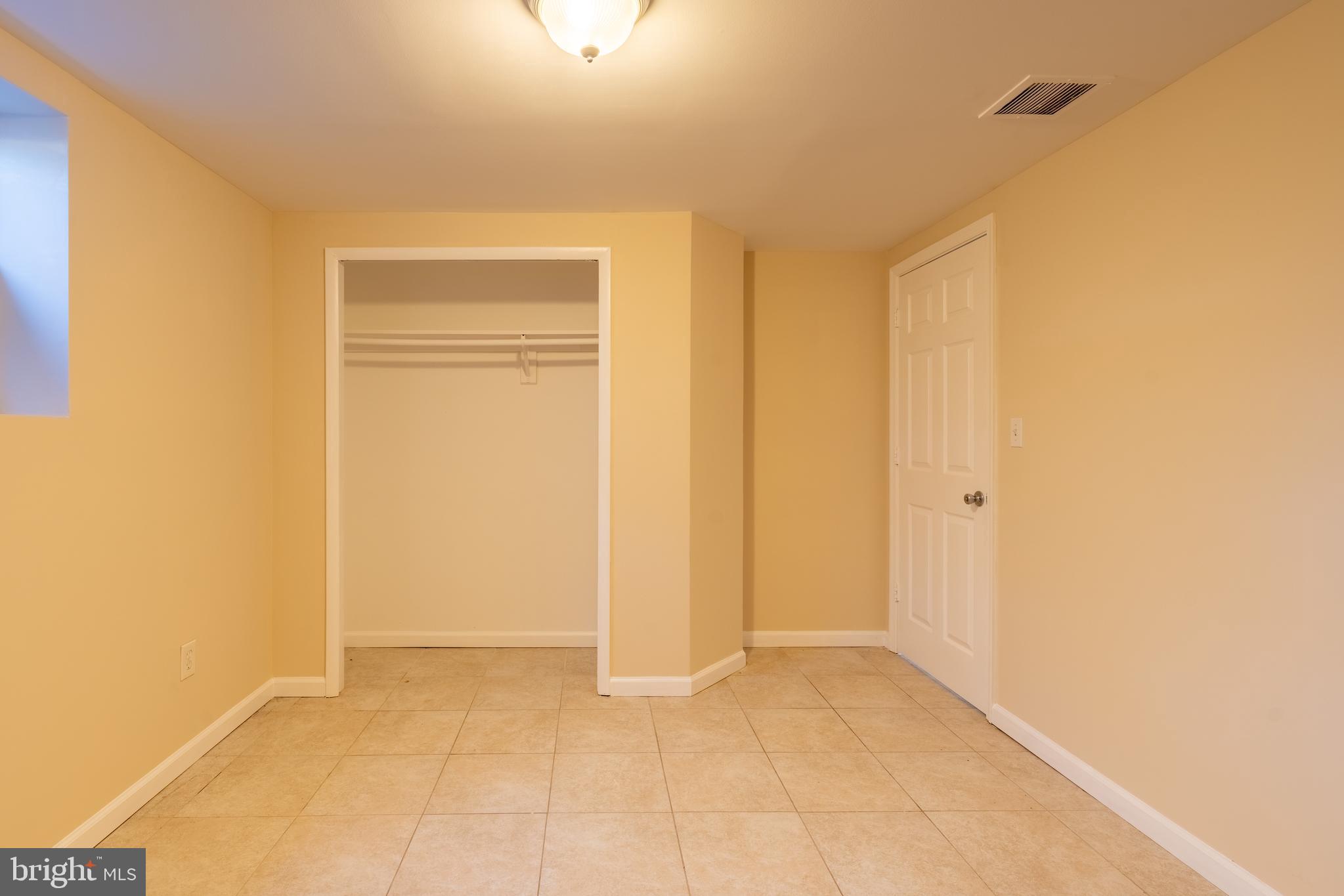 906 Buckingham Drive Silver Spring, MD 20901 - Photo 23 of 26 Lower Level Bedroom