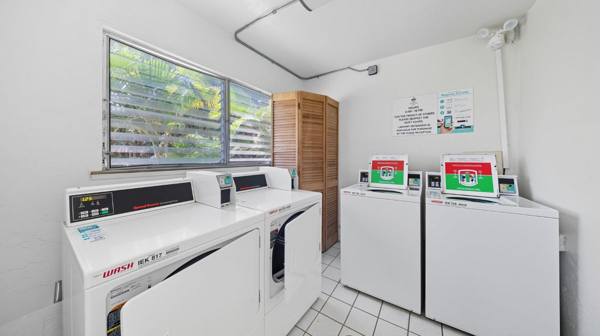 525 Aleka Loop, Unit A12 Kapaa, HI 96746 - Photo 19 of 20 a utility room with washer and dryer