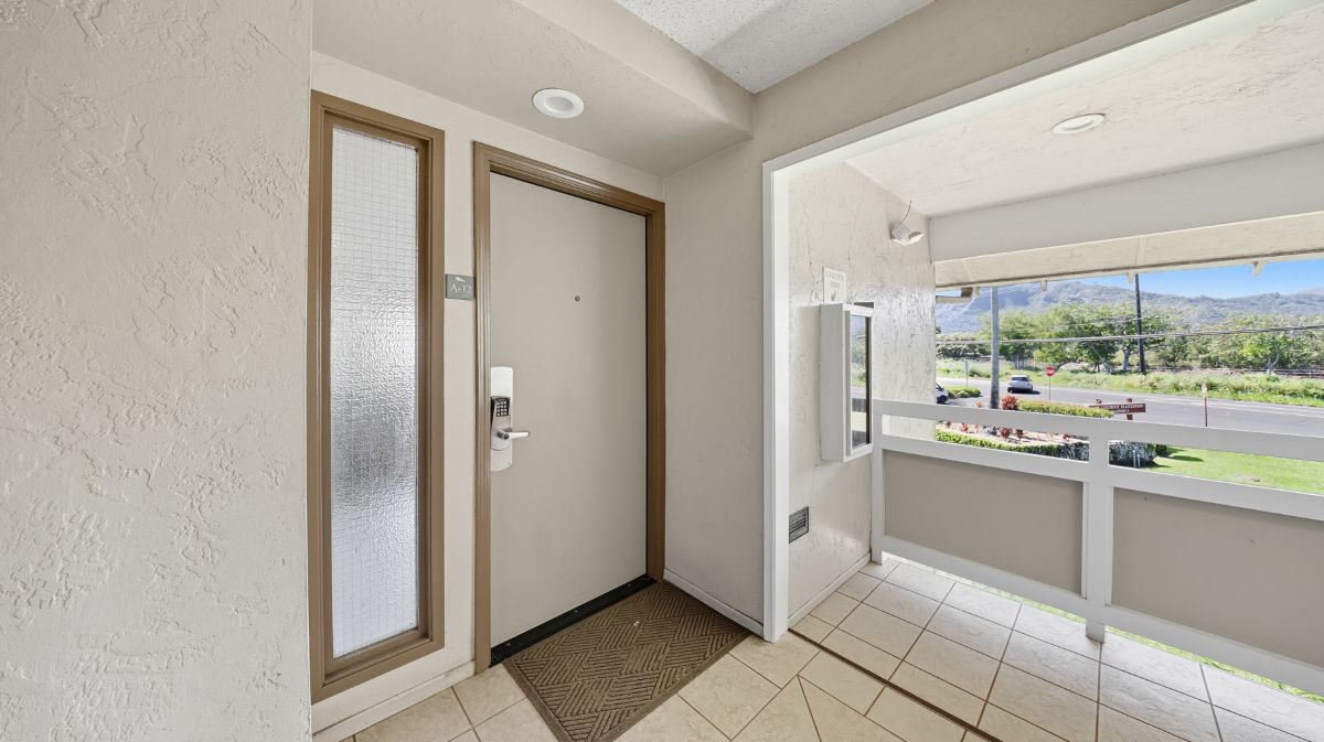 525 Aleka Loop, Unit A12 Kapaa, HI 96746 - Photo 3 of 20 a large kitchen with a window and stainless steel appliances