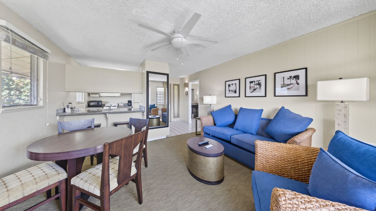 525 Aleka Loop, Unit A12 Kapaa, HI 96746 - Photo 7 of 20 a living room with furniture a rug and a table