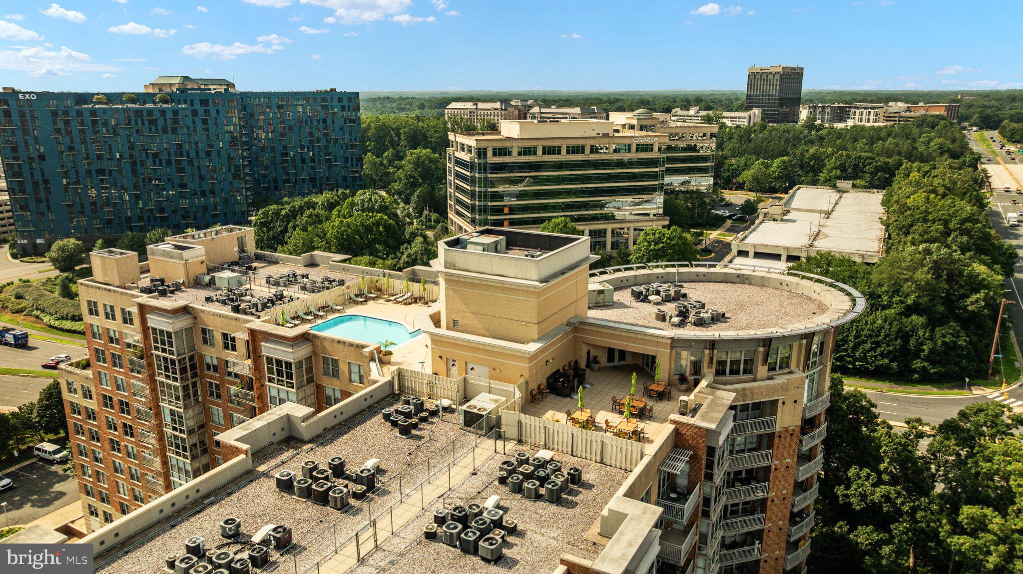 11800 Sunset Hills Road, Unit 815 Reston, VA 20190 - Photo 38 of 61 Rooftop Pool + Outdoor Grills & Dining Areas