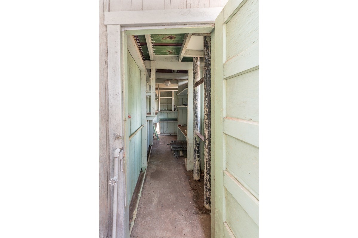4472 A Panako Road Waimea, HI 96796 - Photo 22 of 25 a view of a hallway with a white walls