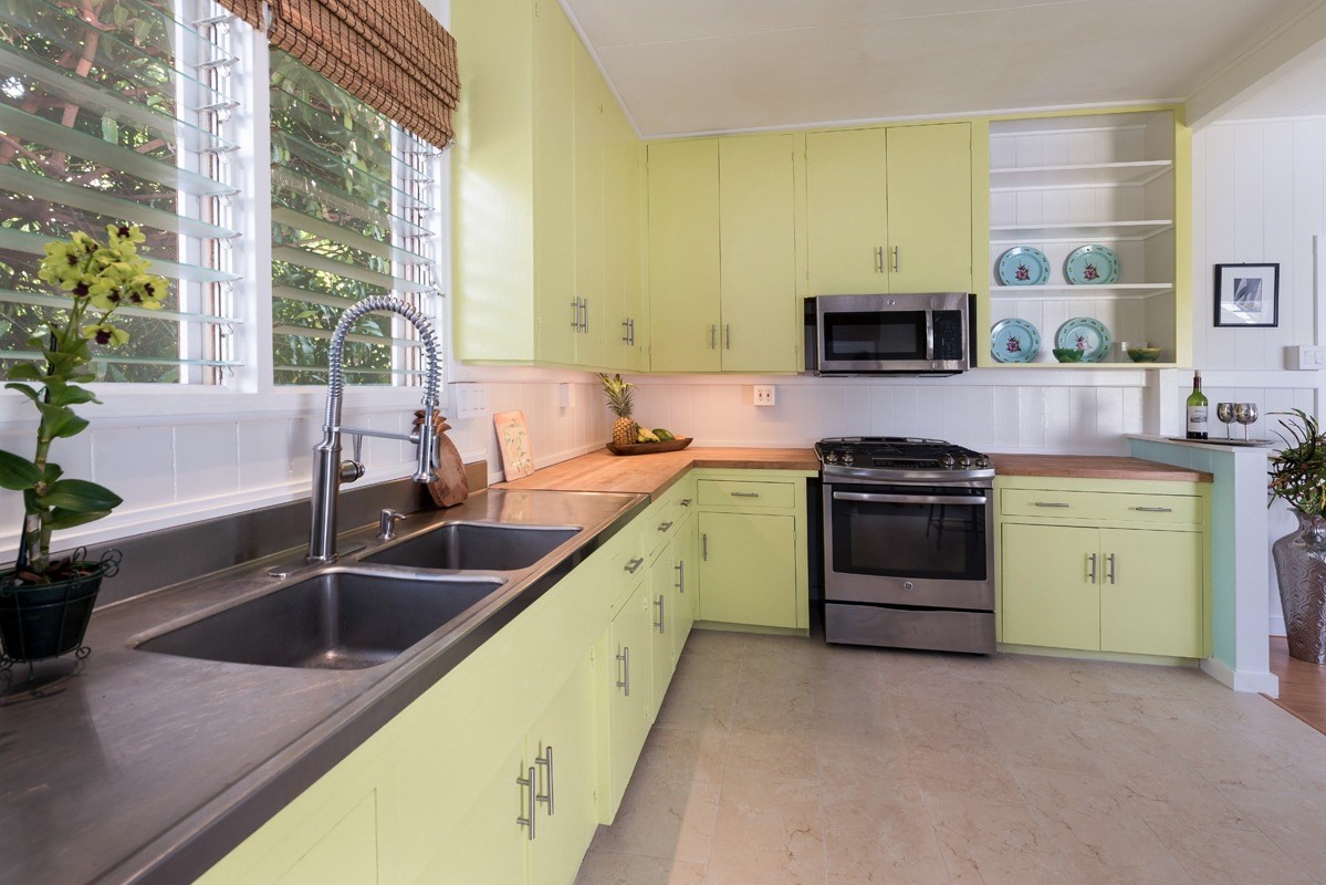 4472 A Panako Road Waimea, HI 96796 - Photo 4 of 25 a kitchen with a sink and a stove top oven
