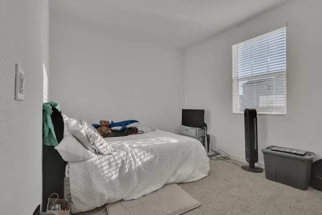 a workspace with furniture and window