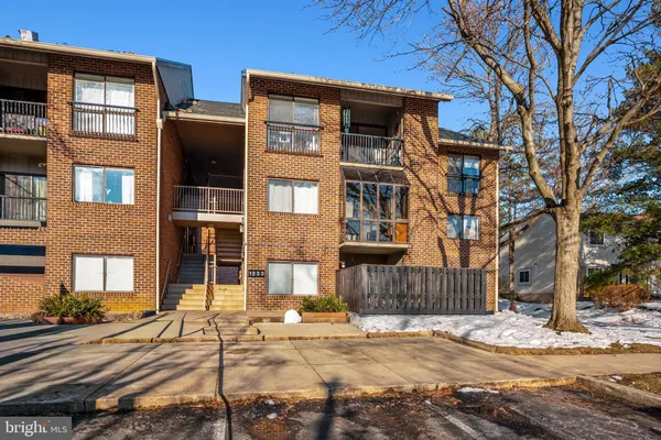 a view of a house with a snow on the road