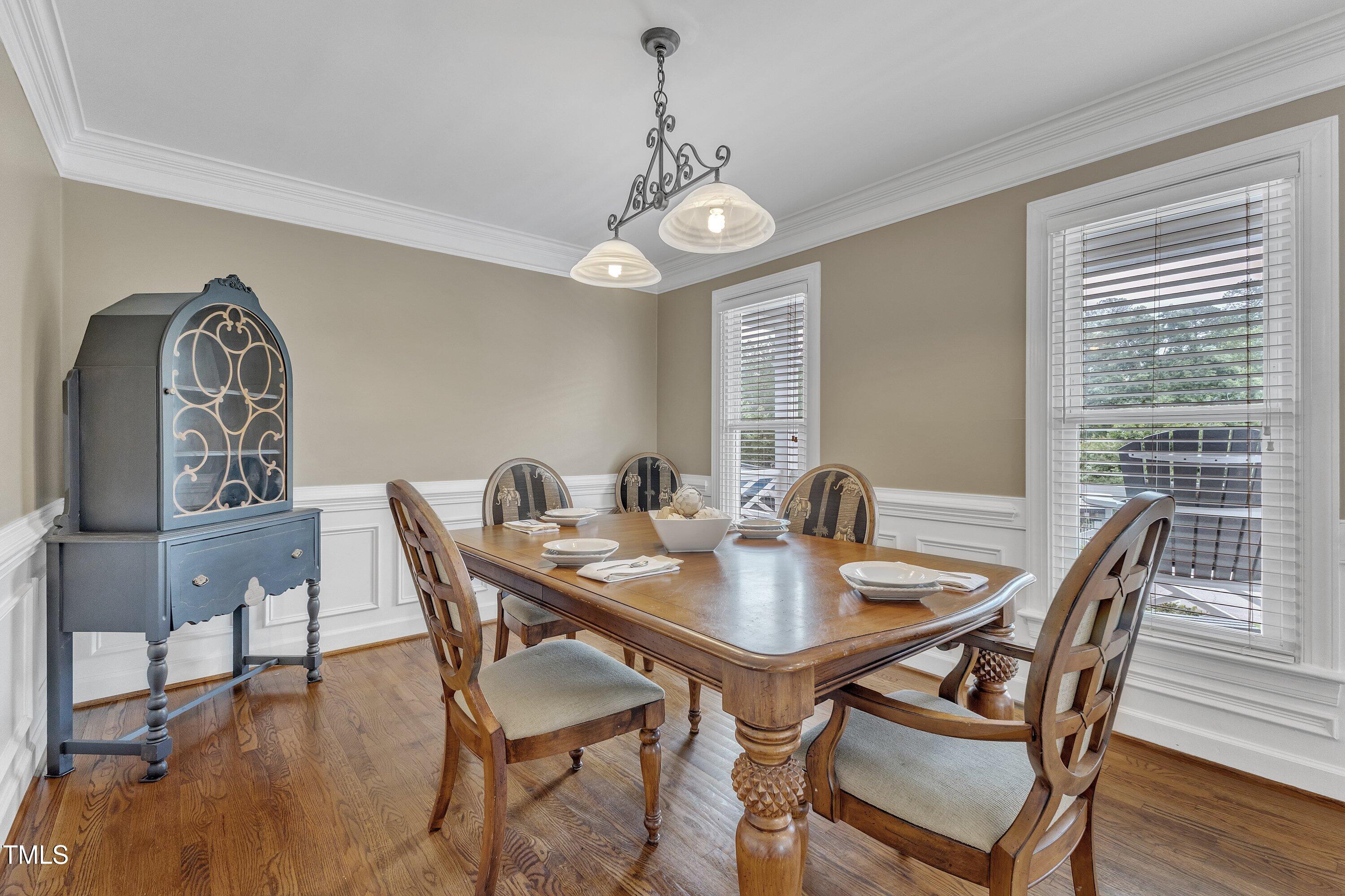 2721 Dahlgreen Road Raleigh, NC 27615 - Photo 11 of 59 a view of a dining room with furniture window and wooden floor